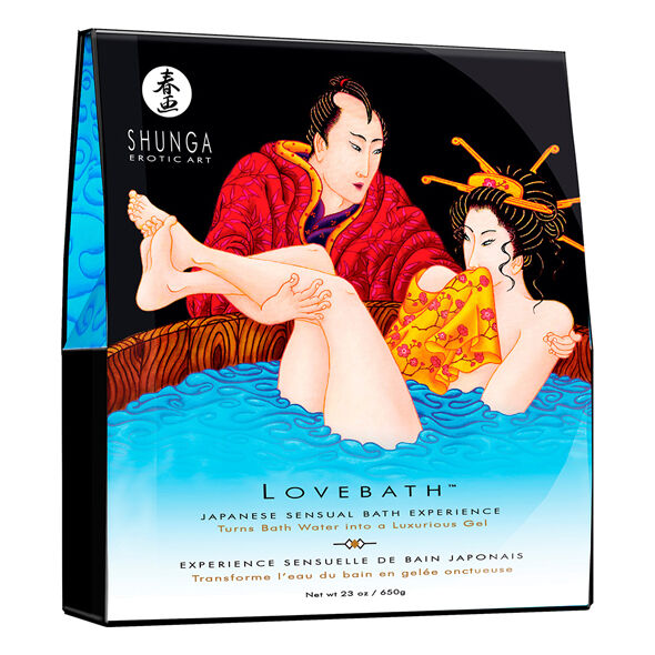 SHUNGA LOVEBATH TENTACIONES DEL OCEANO bottle with ocean-themed design, surrounded by bath accessories.