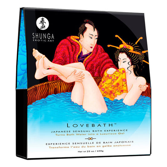 SHUNGA LOVEBATH TENTACIONES DEL OCEANO bottle with ocean-themed design, surrounded by bath accessories.