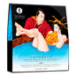 SHUNGA LOVEBATH TENTACIONES DEL OCEANO bottle with ocean-themed design, surrounded by bath accessories.