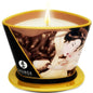 SHUNGA Mini Caress by Candlelight chocolate massage candle in a 170 ml container with a warm glow and rich texture.