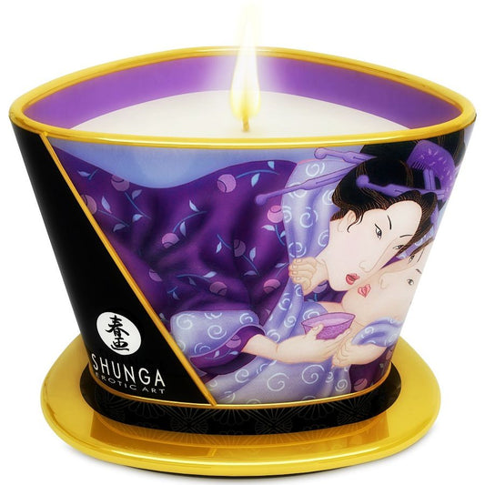 SHUNGA Mini Caress by Candlelight massage candle with exotic fruit scent, 170 ml, displayed with melting wax and wick.