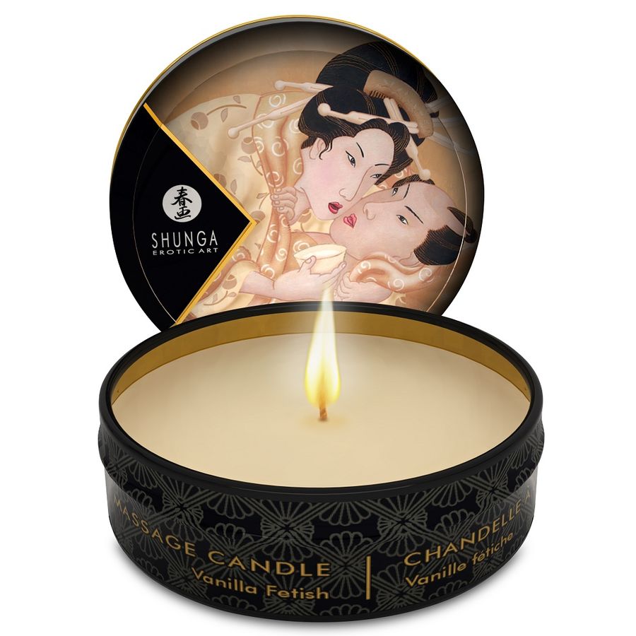 SHUNGA Mini Caress by Candlelight vanilla massage candle in a small jar, with melted wax and wick visible.