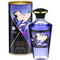 Aceite de masaje SHUNGA con efecto calor sabor frutas exóticas, 100 ml, muestra el frasco y etiqueta del producto.