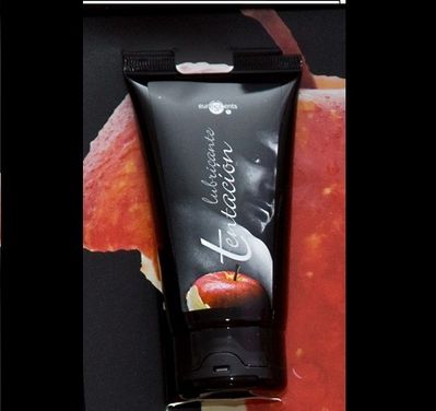 TENTACION red fruit flavored lubricant in a 75 ml bottle with vibrant packaging on a white background.