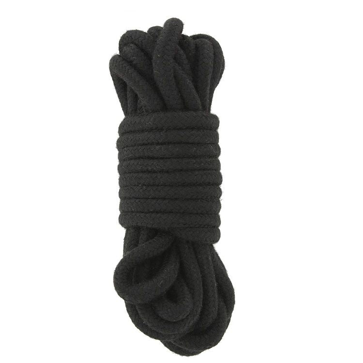 TOYJOY Just For You BDSM starter kit featuring restraints, cuffs, and a blindfold on a soft surface.