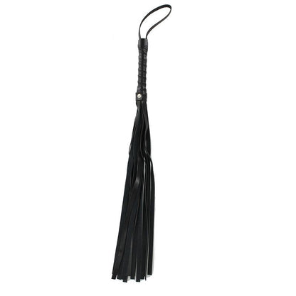 TOYJOY BDSM starter kit with restraints, a blindfold, and accessories for beginners displayed on a soft fabric background.