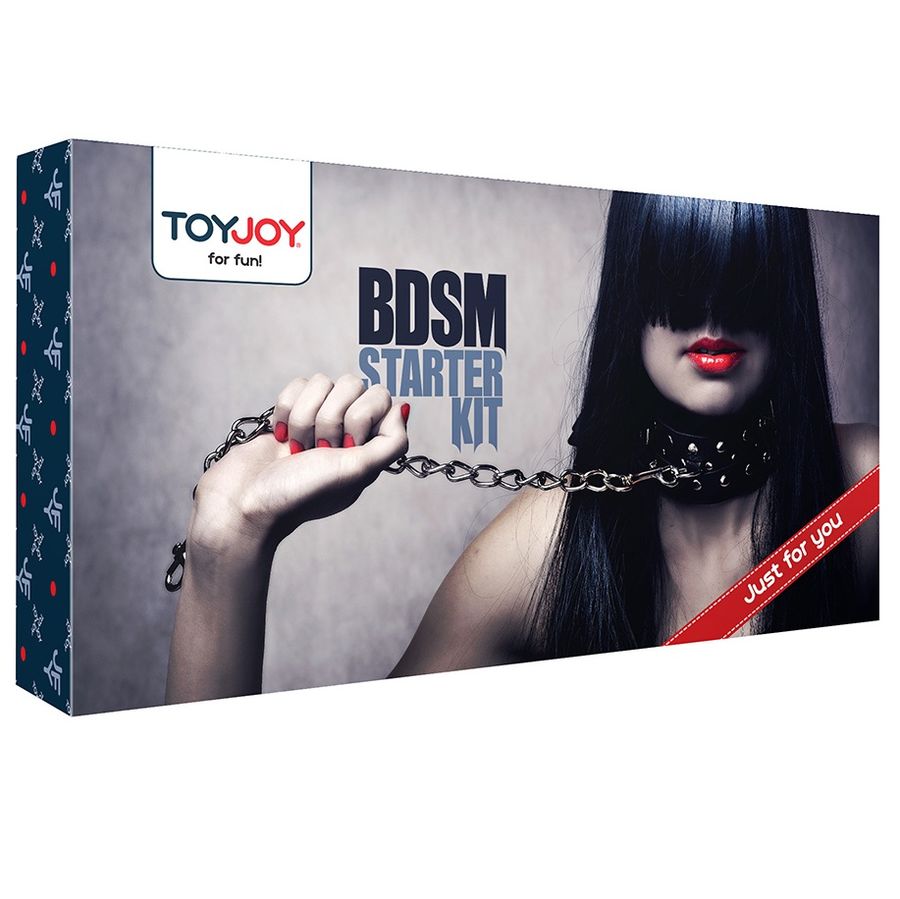 TOYJOY Just For You BDSM Starter Kit with cuffs, blindfold, and accessories displayed on a dark background.