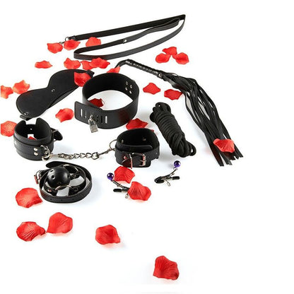 TOYJOY Just For You BDSM Starter Kit featuring restraints, blindfold, and other accessories on a dark background.